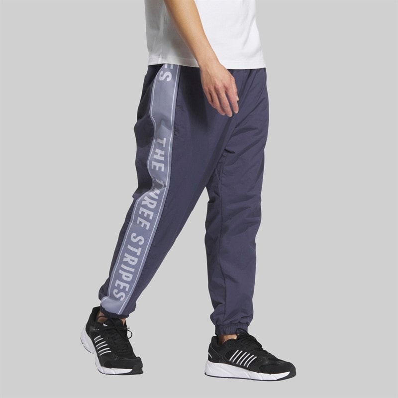 adidas Mens Wording Loose Fit Woven Track Pants Shadow Navy - Image 1
